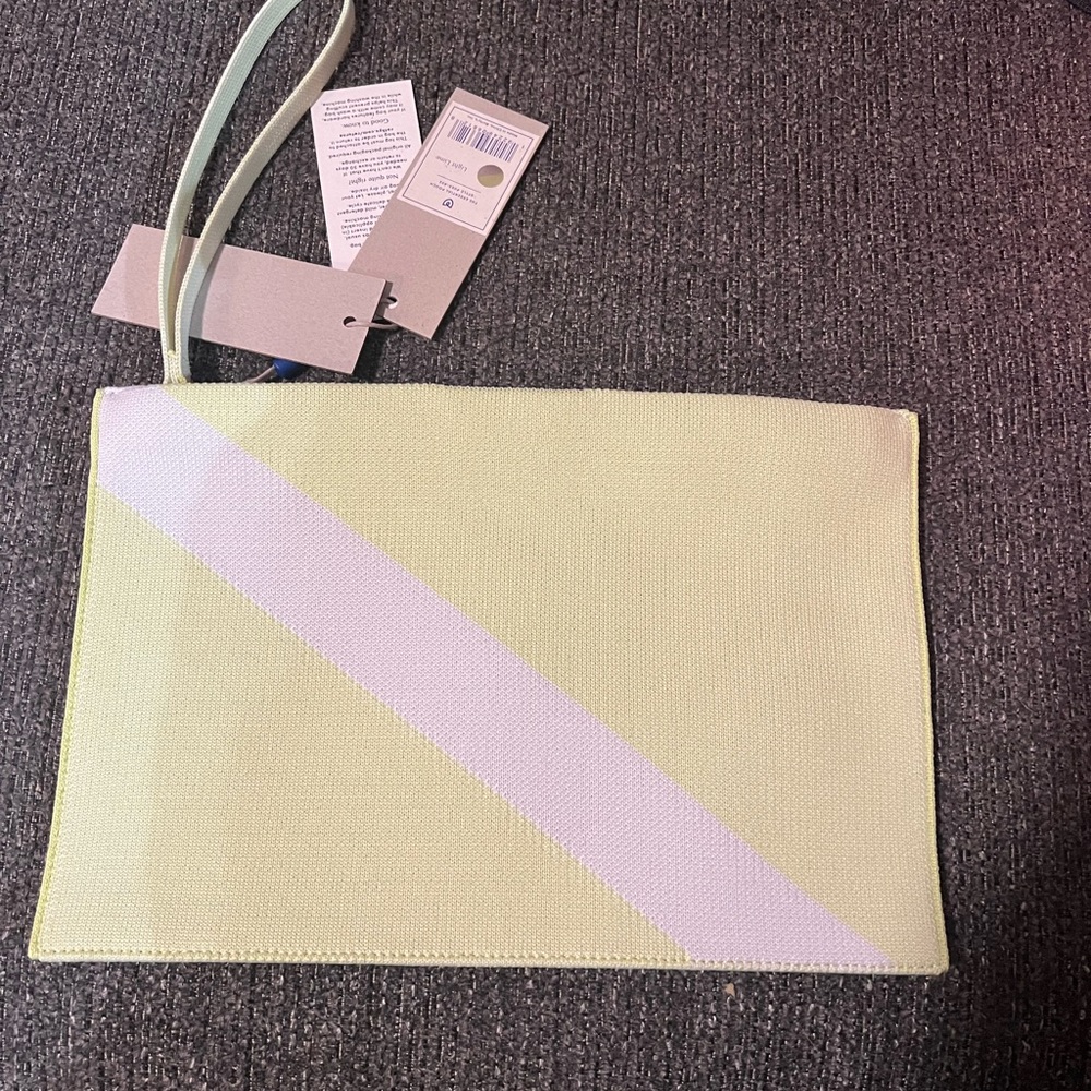 NWT Rothy’s lime light essential pouch